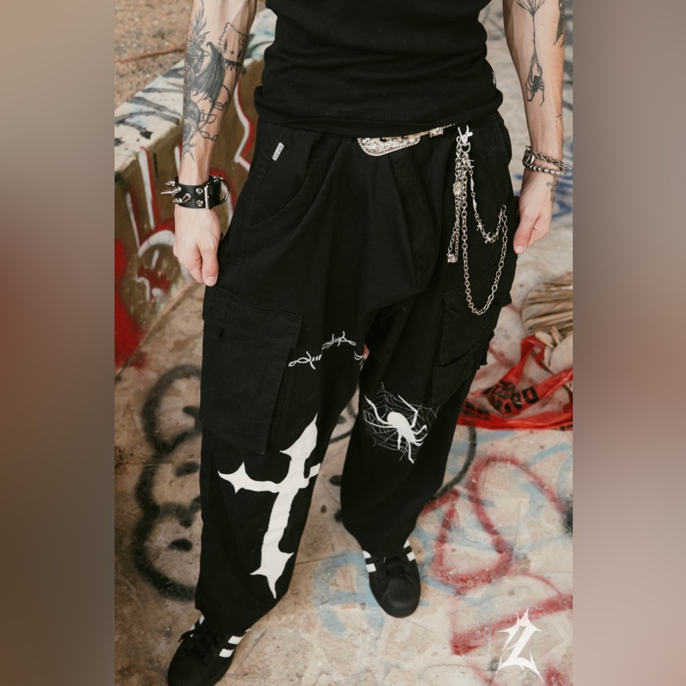 Black cargo pants with white designs 🕷️✝️